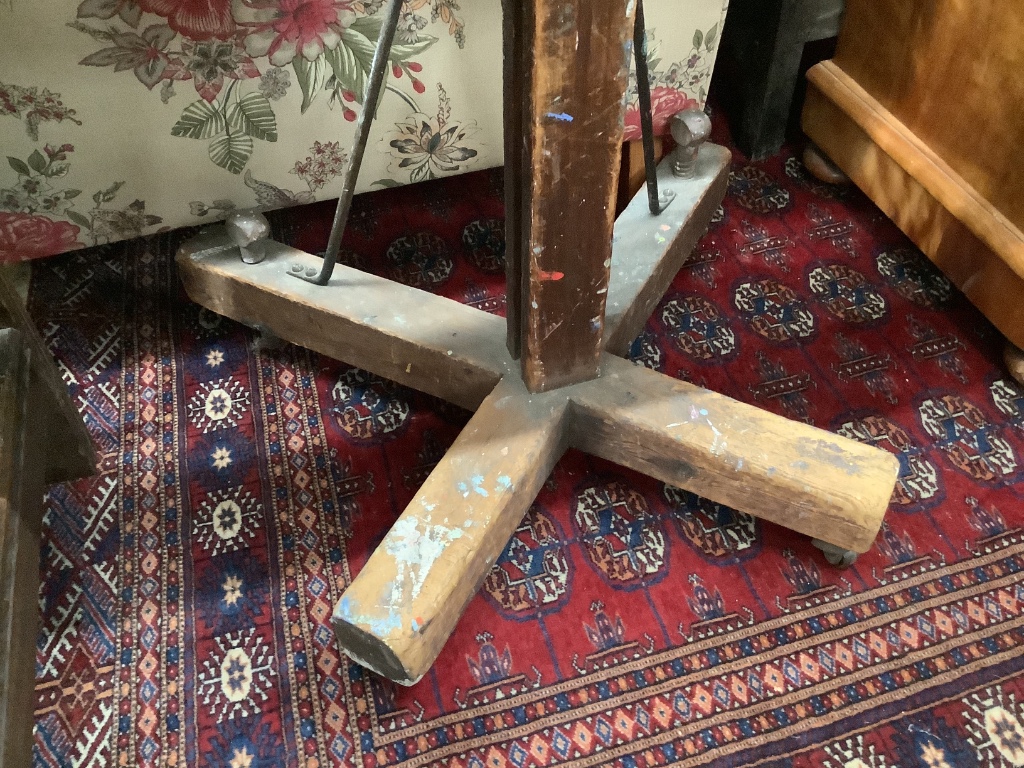 An Edwardian adjustable studio easel, width 66cm